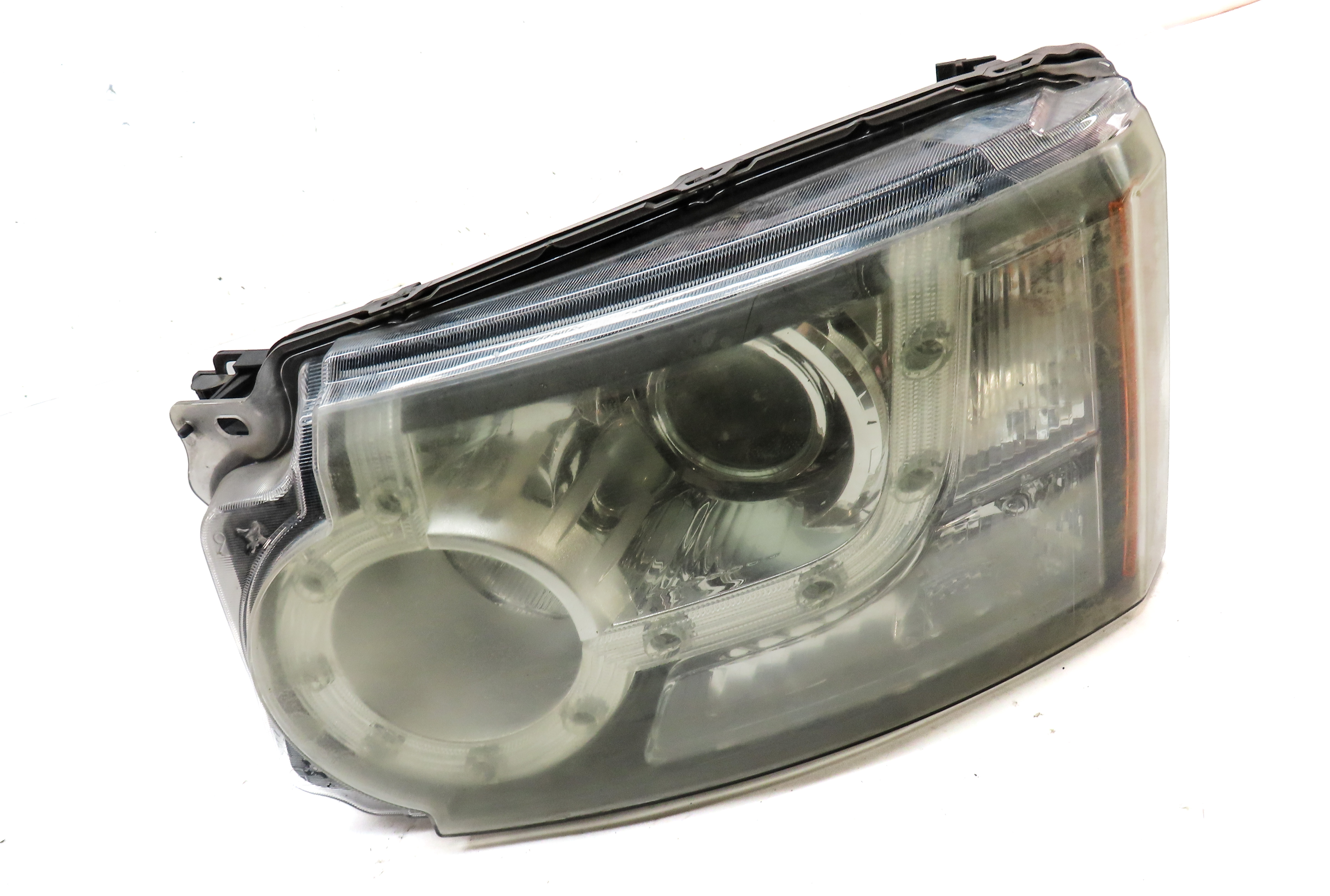 2010-2012 LAND ROVER LR4 - LEFT FRONT DRIVER HALOGEN HEADLIGHT (MANUAL LEVELING) — exact item pictured